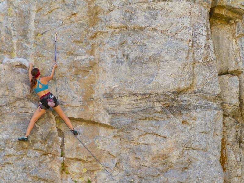 Rock climbing in Jibhi and Sissu on secluded rock faces surrounded by serene mountain landscapes.